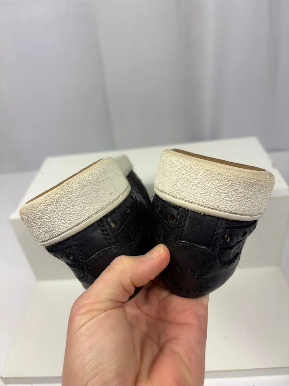 UGG CAS‎ Perforated Slip On Sneaker in Black.